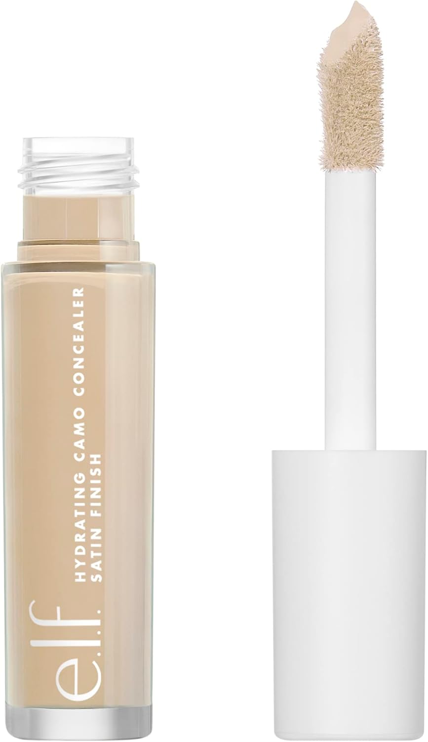 e.l.f. Hydrating Camo Concealer — lightweight, full coverage, all-day wear. Conceals, corrects & hydrates with a satin finish. Shade: Light Sand. Available in 25 shades